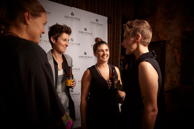 Sara Medd chatting with Robin Roemer and 2012 Calendar Girls Kelli Griggs and Ashley LaRocque. Photo via Sara Tollefson.