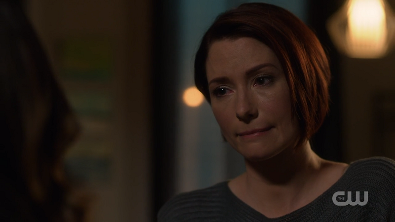 Alex looks sadly at Maggie