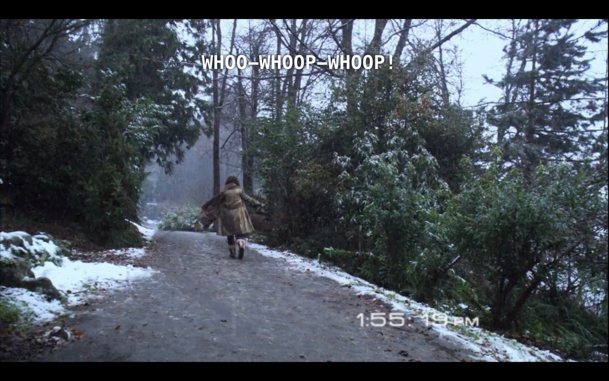 Bette continues her happy dance down a snow-dusted dirt path. She continues to yell, "Whoo-whoop-whoop!"