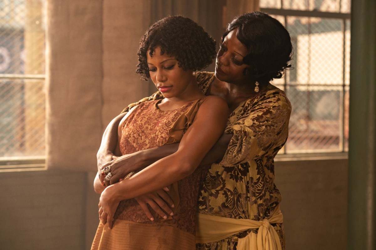 Dussie Mae (Taylour paige) and Ma Rainey (Viola Davis) embrace in this still from "Ma Rainey's Black Bottom"