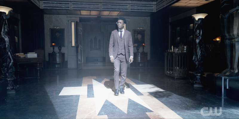 Luke Fox walking through Wayne Manor