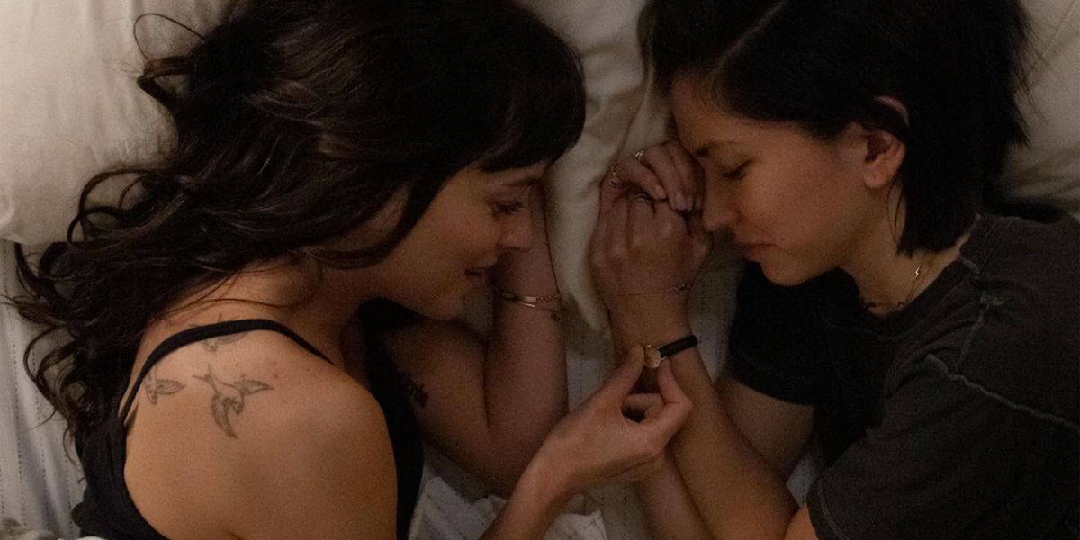 Am I OK?: Dakota Johnson and Sonoya Mizuno lie in bed next to each other.
