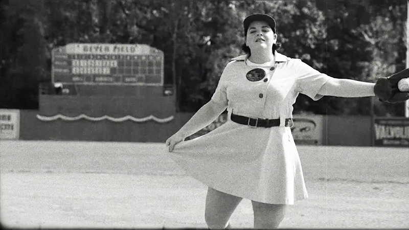 Jo curtsies in her uniform