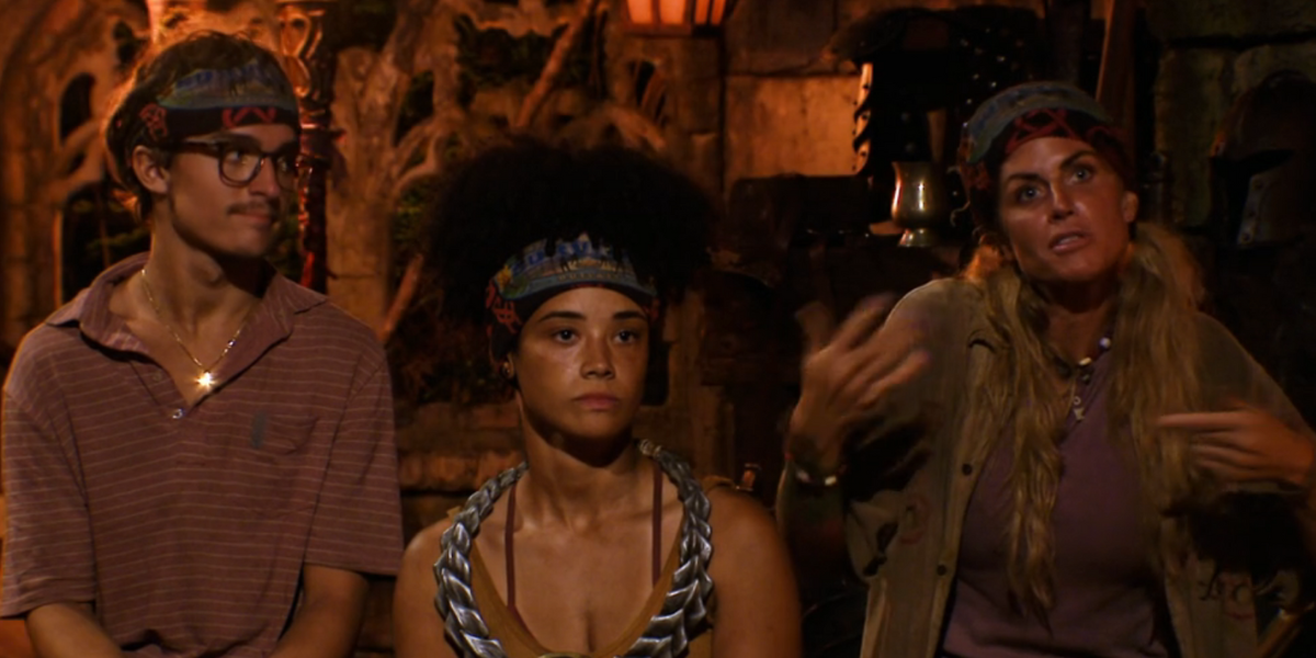 Survivor Season 44 contestant Carolyn Wiger at tribal council, explaining with wild gesticulations that she is both emotional and strategic.