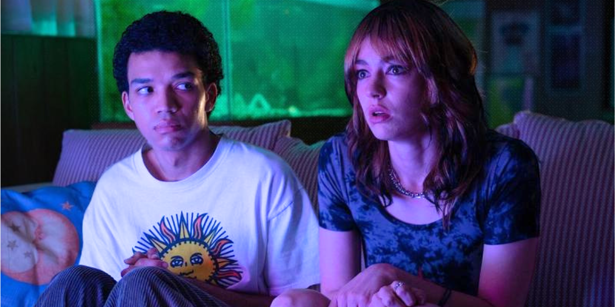 Justice Smith sits on a couch next to Jack Haven in I Saw the TV Glow