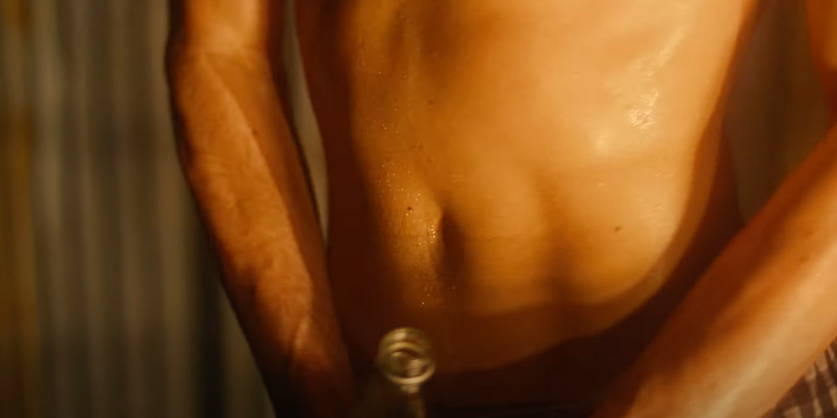 A close up of a sweaty torso from Tove Lo and SG Lewis' HEAT music video
