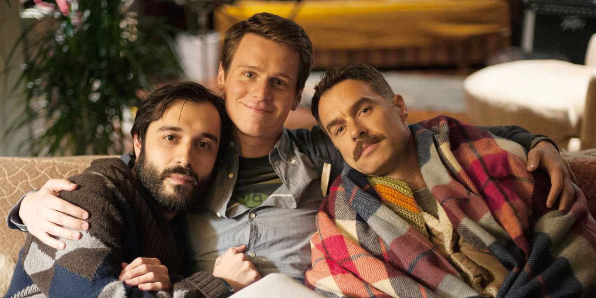 HBO Looking trans: the three leads o Looking pose in a press photo sitting on a couch looking into the camera.