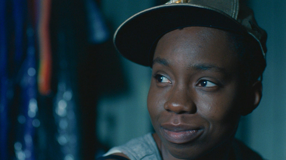 Best lesbian movies #10: A close-up of Adepero Oduye wearing an askew hat.