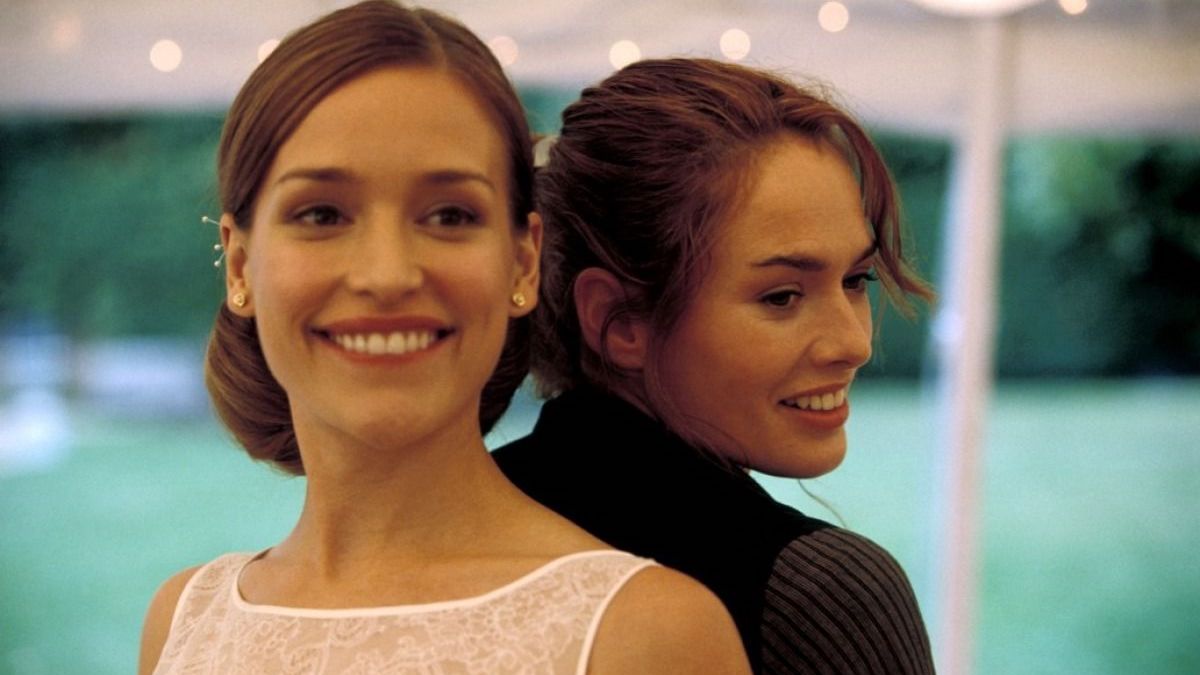 Best lesbian movies #15: Piper Perabo smiles with her back to Lena Headey