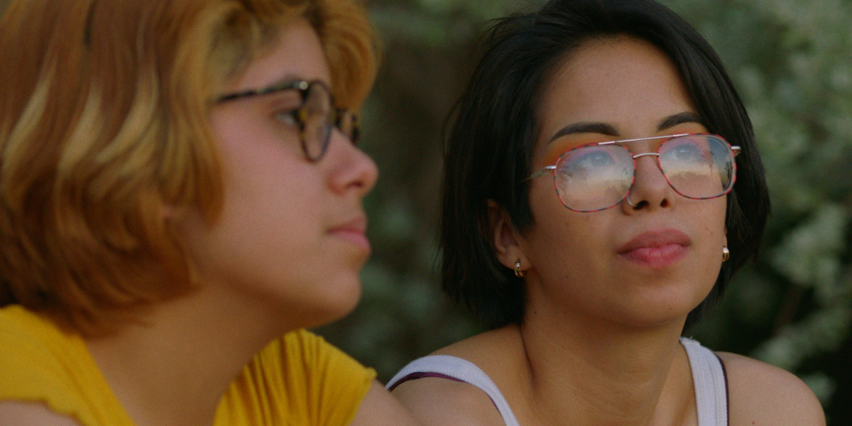 Hummingbirds documentary: Silvia Del Carmen Castaños and Estefanía “Beba” Contreras sit next to each other and look out at the view
