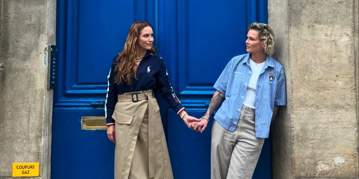 Sophia Bush and Ashlyn Harris hold hands in Paris