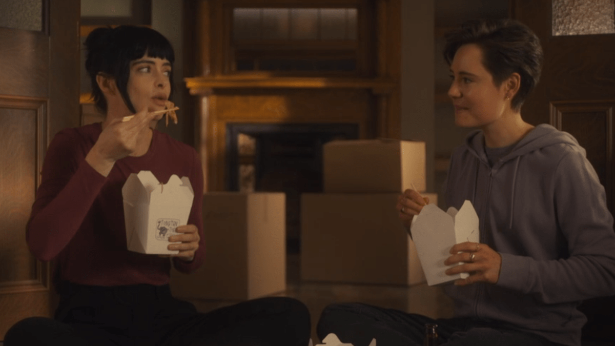 Orphan Black: Echoes, Kira and Eleanor eating Chinese food on the floor of their new apartment