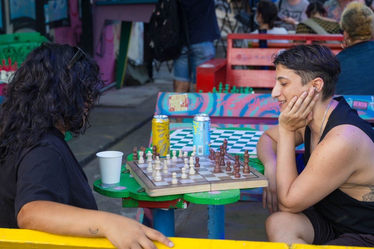 Regular attendee Jo playing chess 