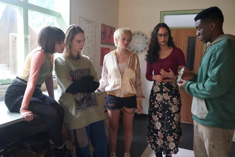 teens gathered in a classroom