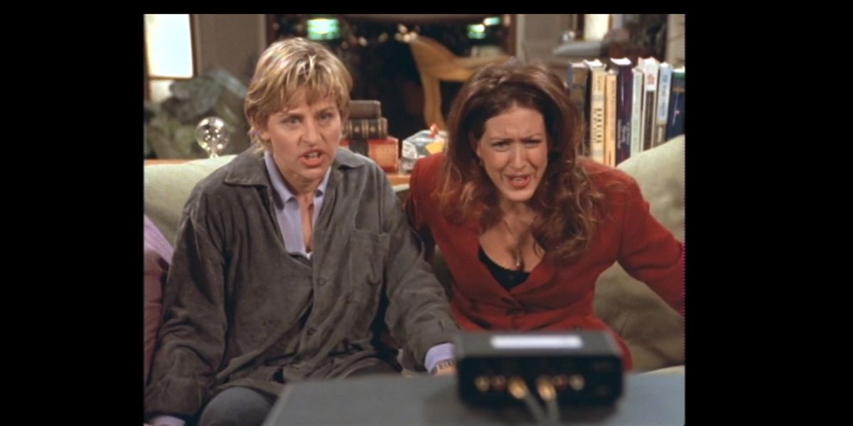 Rainbow Age of Television: A still from Ellen of Ellen Degeneres and Joely Fisher looking upset as they watch TV