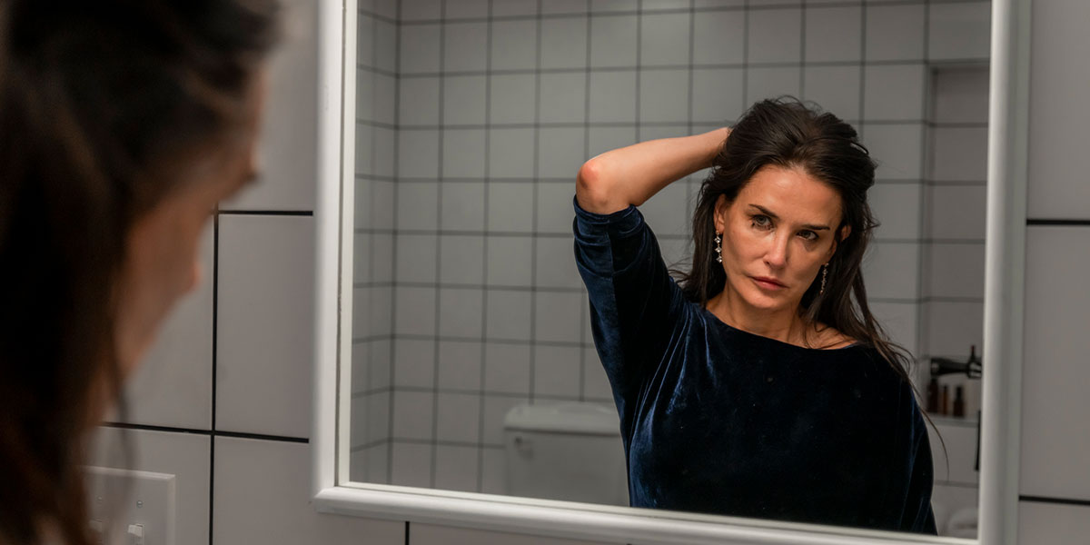 TIFF 2024: Demi Moore stares into a mirror in The Substance