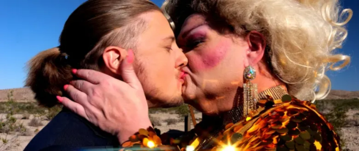 A drag queen and a trans guy make out in the desert