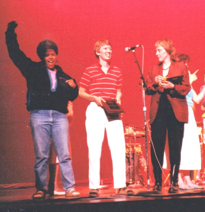 1987-a - LC's board president Kathy Blake and margy accepting an award for LC at the 1987 National Women's Music Festival