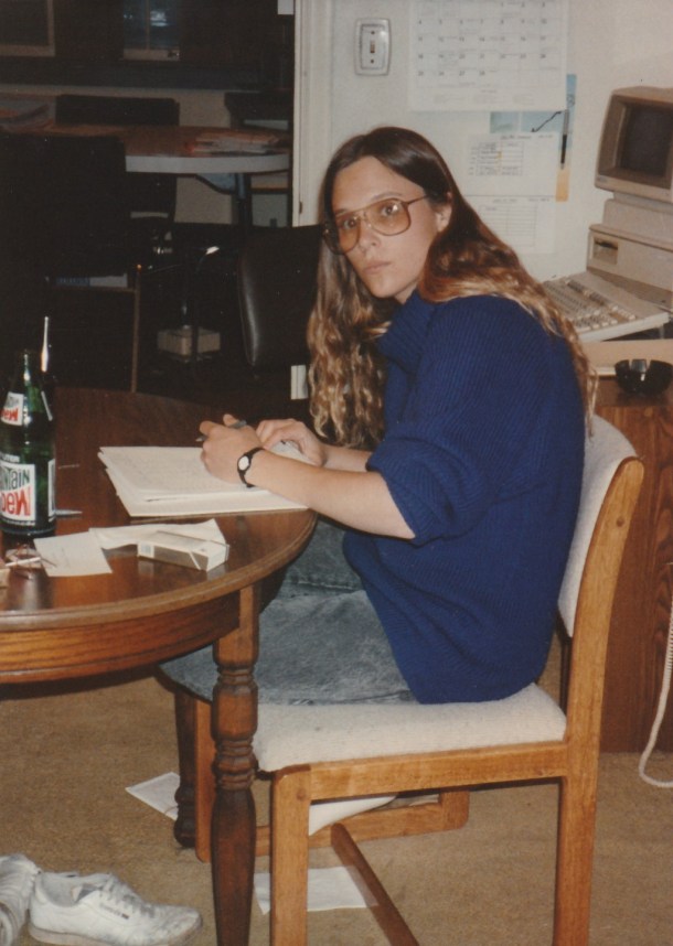 working on an issue at the table in 1988