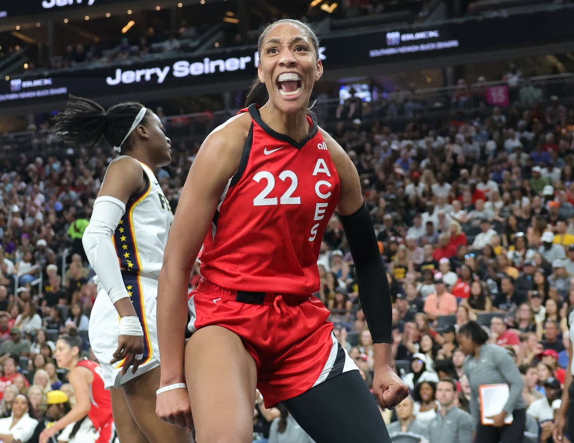 LAS VEGAS, NEVADA - JULY 02: A'ja Wilson #22 of the Las Vegas Aces reacts after scoring against the Indiana Fever in the third quarter of their game at T-Mobile Arena on July 02, 2024 in Las Vegas, Nevada. The Aces defeated the Fever 88-69. NOTE TO USER: User expressly acknowledges and agrees that, by downloading and or using this photograph, User is consenting to the terms and conditions of the Getty Images License Agreement. (Photo by Ethan Miller/Getty Images)