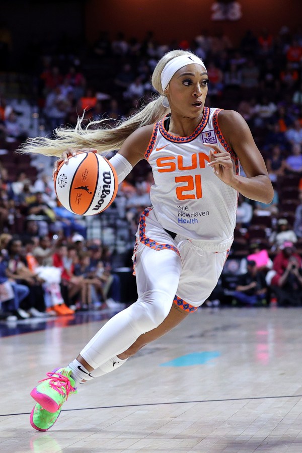 UNCASVILLE, CONNECTICUT - SEPTEMBER 19: DiJonai Carrington #21 of the Connecticut Sun drives to the basket in the first quarter against the Chicago Sky at Mohegan Sun Arena on September 19, 2024 in Uncasville, Connecticut. NOTE TO USER: User expressly acknowledges and agrees that, by downloading and or using this photograph, User is consenting to the terms and conditions of the Getty Images License Agreement. (Photo by Mike Lawrie/Getty Images)