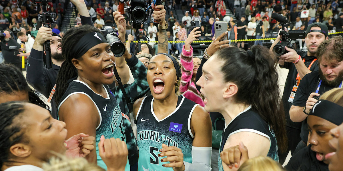 LAS VEGAS, NEVADA - OCTOBER 06: The New York Liberty, including (L-R) Jonquel Jones #35, Kayla Thornton #5 and Breanna Stewart #30, celebrate on the court after defeating the Las Vegas Aces 76-62 in Game Four of the 2024 WNBA Playoffs semifinals to win the series three games to one at Michelob ULTRA Arena on October 06, 2024 in Las Vegas, Nevada. NOTE TO USER: User expressly acknowledges and agrees that, by downloading and or using this photograph, User is consenting to the terms and conditions of the Getty Images License Agreement. (Photo by Ethan Miller/Getty Images)