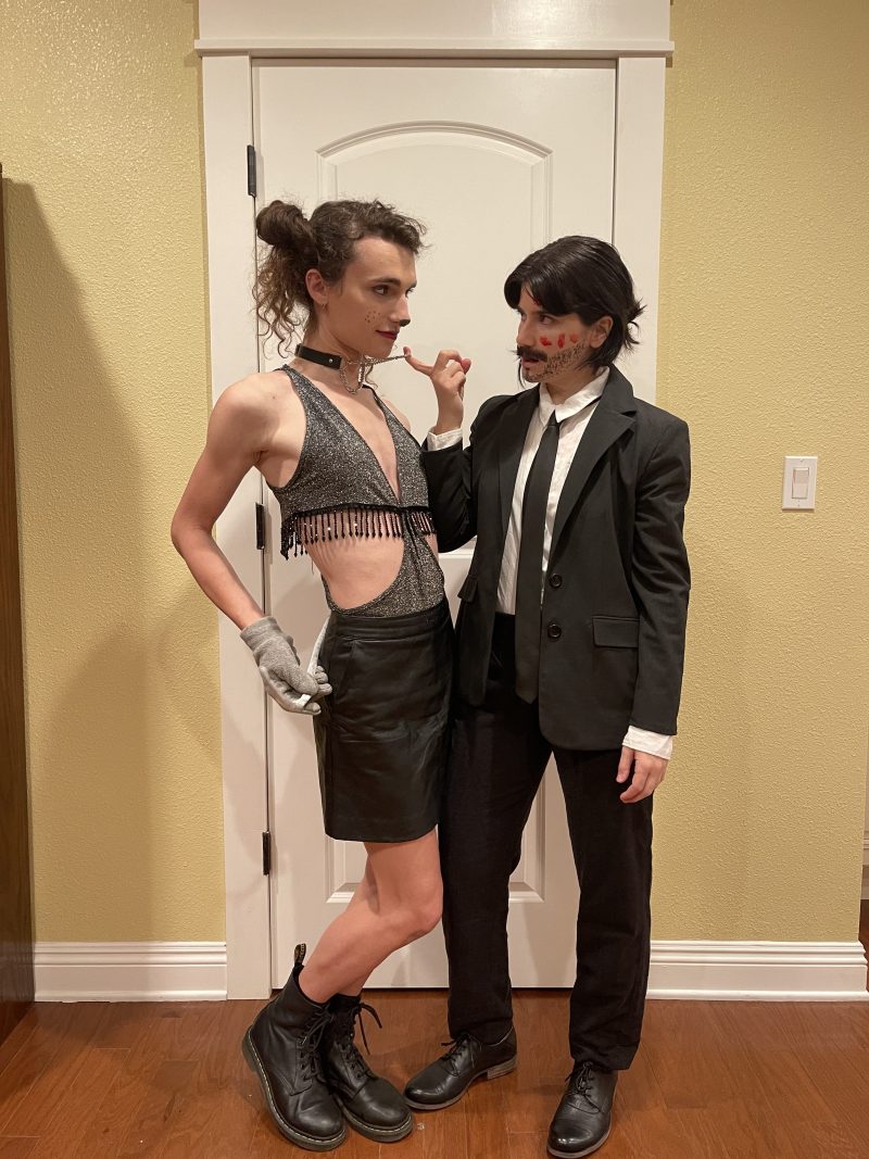 Drew and Elise pose as John Wick's slutty dog and John Wick with Elise holding Drew by the collar. 