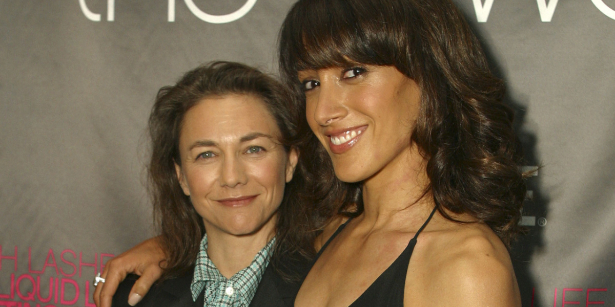 Ilene Chaiken and Jennifer Beals pose at the original L Word premiere. They have recently started a queer media company together called Run-A-Muck.