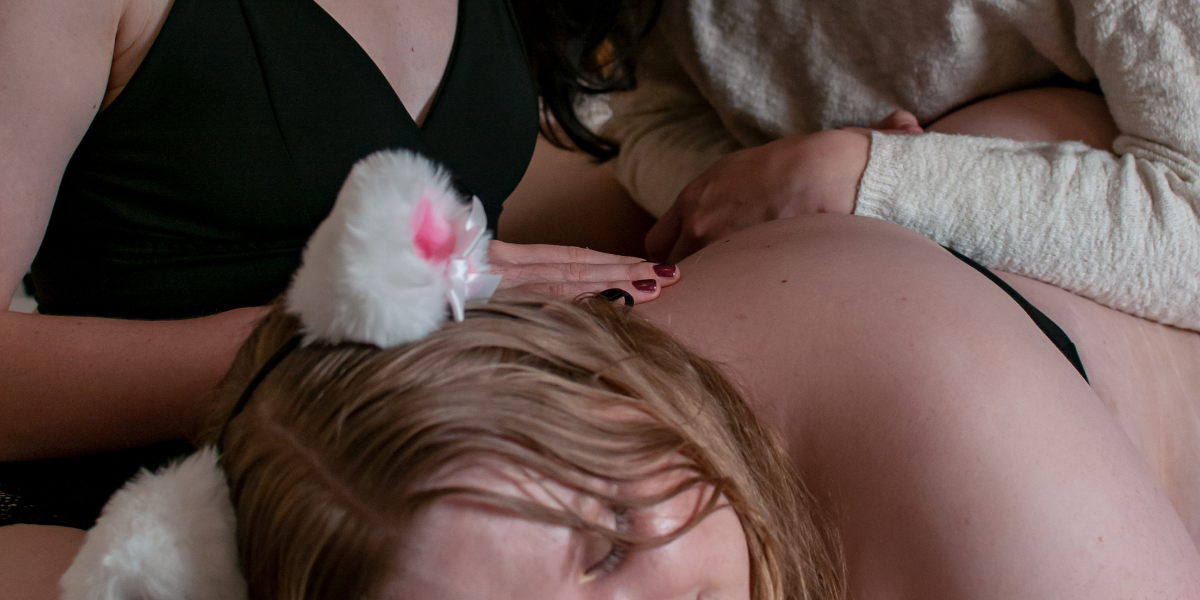 three people in a boudoir shoot