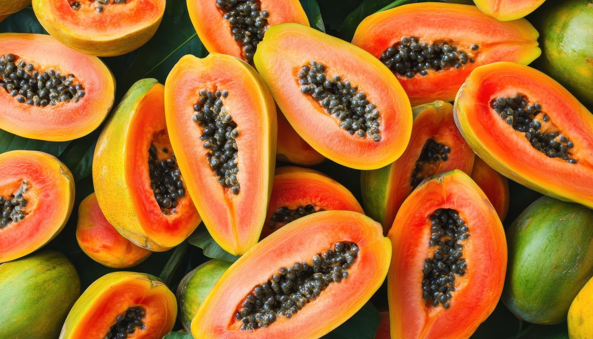 Fresh and ripe papaya slices showcasing a vibrant tropical delight at a local market