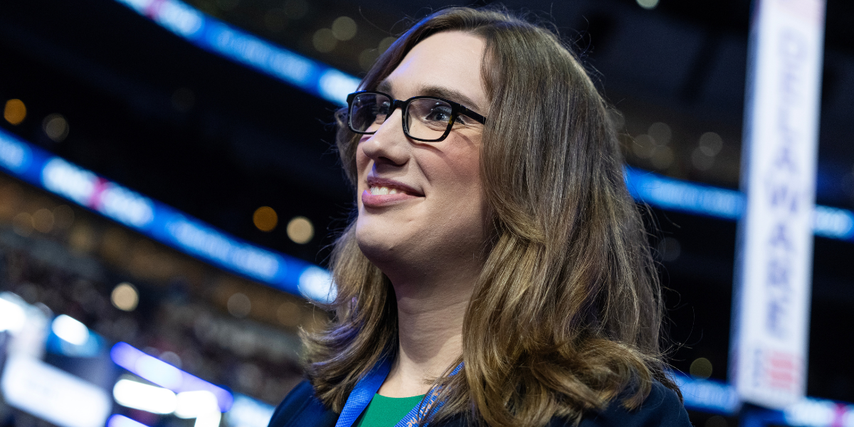 A close up of Sarah McBride smiling at the Democratic National Convention