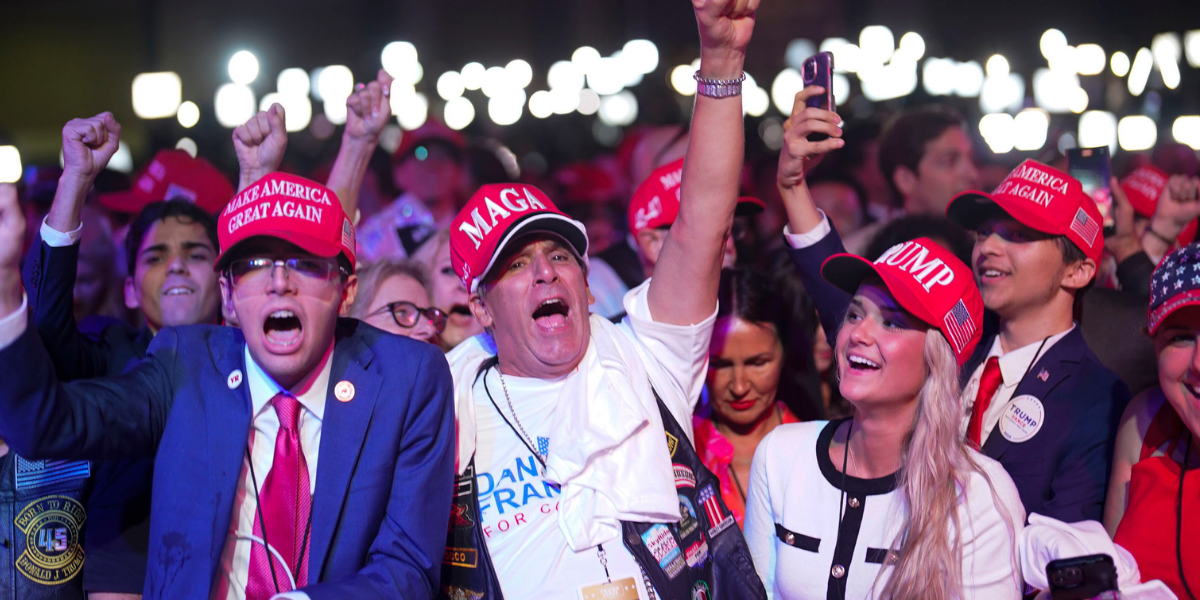 WEST PALM BEACH,FL - NOVEMBER 5: Supporters of Republican presidential nominee Donald Trump cheer as results are announced during an election night watch party at the Palm Beach County Convention Center in West Palm Beach, FL, on Tuesday, November 5, 2024. (Photo by Jabin Botsford/The Washington Post via Getty Images)