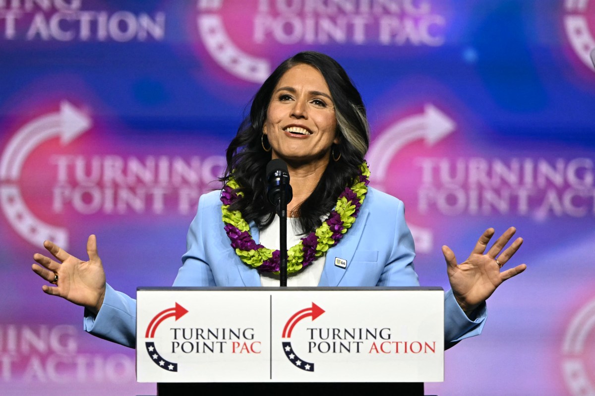 Former US Representative Tulsi Gabbard speaks during a Turning Point Action 'United for Change' campaign rally for former US President and Republican presidential candidate Donald Trump at Thomas & Mack Center in Las Vegas, Nevada, on October 24, 2024. (Photo by Patrick T. Fallon / AFP) (Photo by PATRICK T. FALLON/AFP via Getty Images)