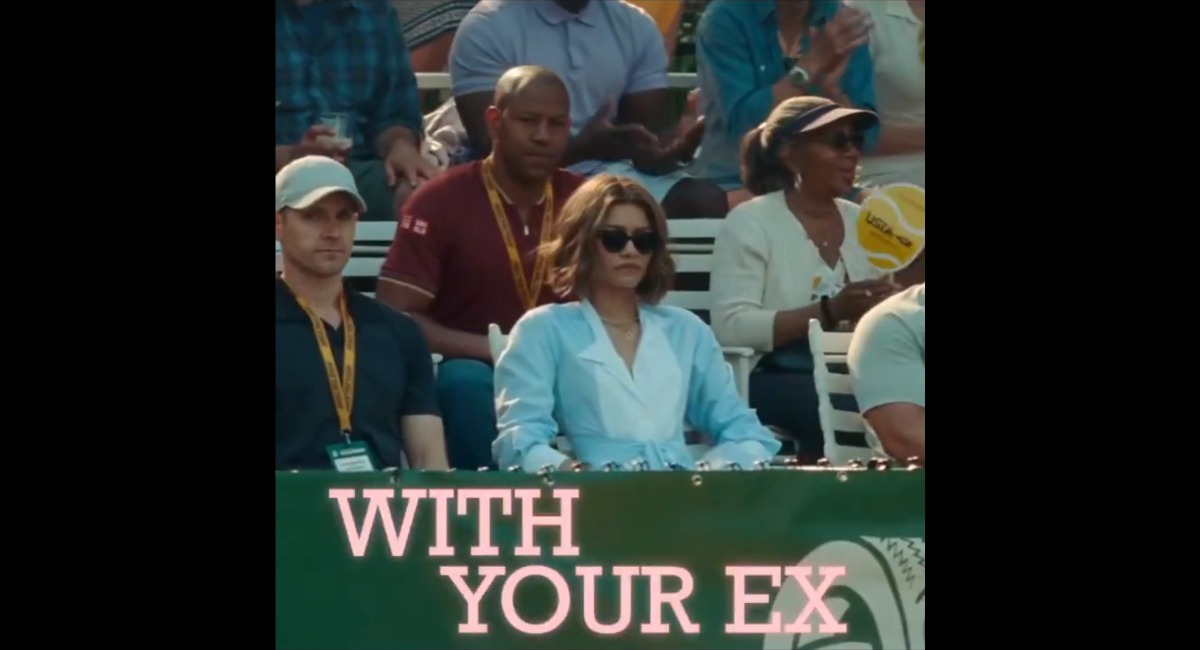 A screenshot from a Challengers edit. Zendaya in the stands with WITH YOUR EX written below her