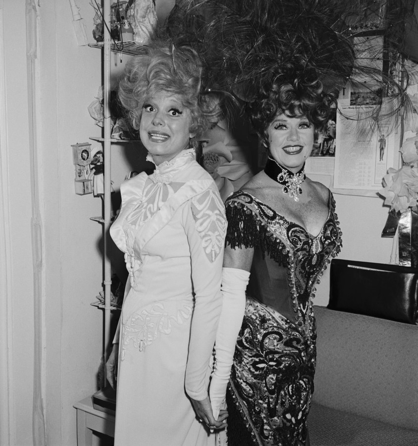 (Original Caption) 10/22/1966-New York, NY: Ginger Rogers stepped into the title role of the smash hit Broadway musical "Hello, Dolly!" by Jerry Herman. Here she's back to back with her predecessor Carol Channing.