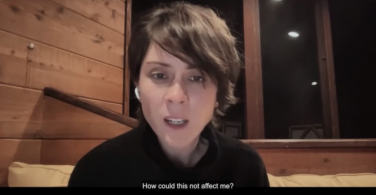 A close up of Tegan Quin on zoom with the text: How could this not affect me?