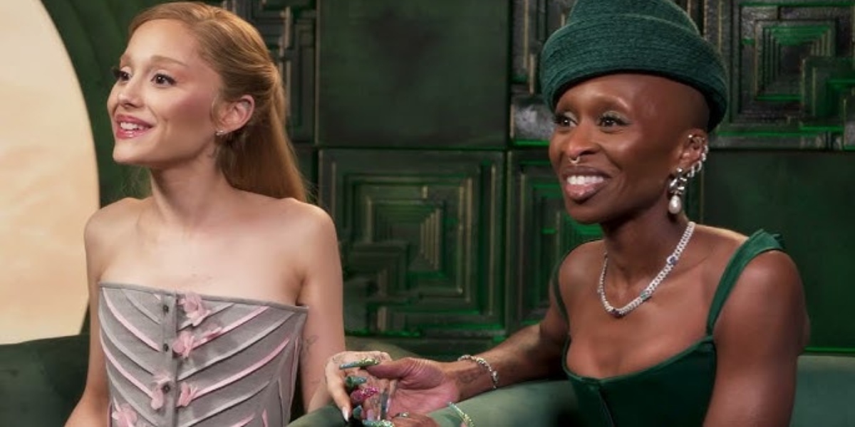 Ariana Grande and Cynthia Erivo in the now viral holding space video from the very gay Wicked press tour