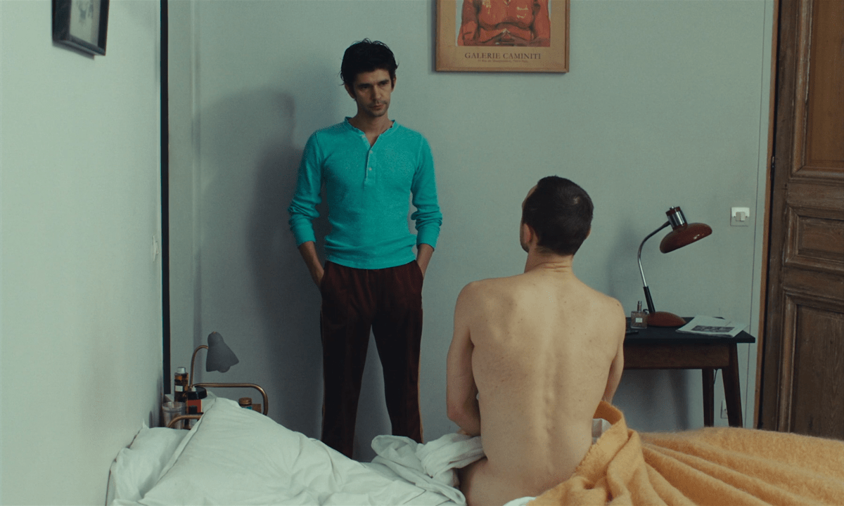 The best gay male movies of all time: Ben Whishaw looks at Franz Rogowski who sits naked on their bed.