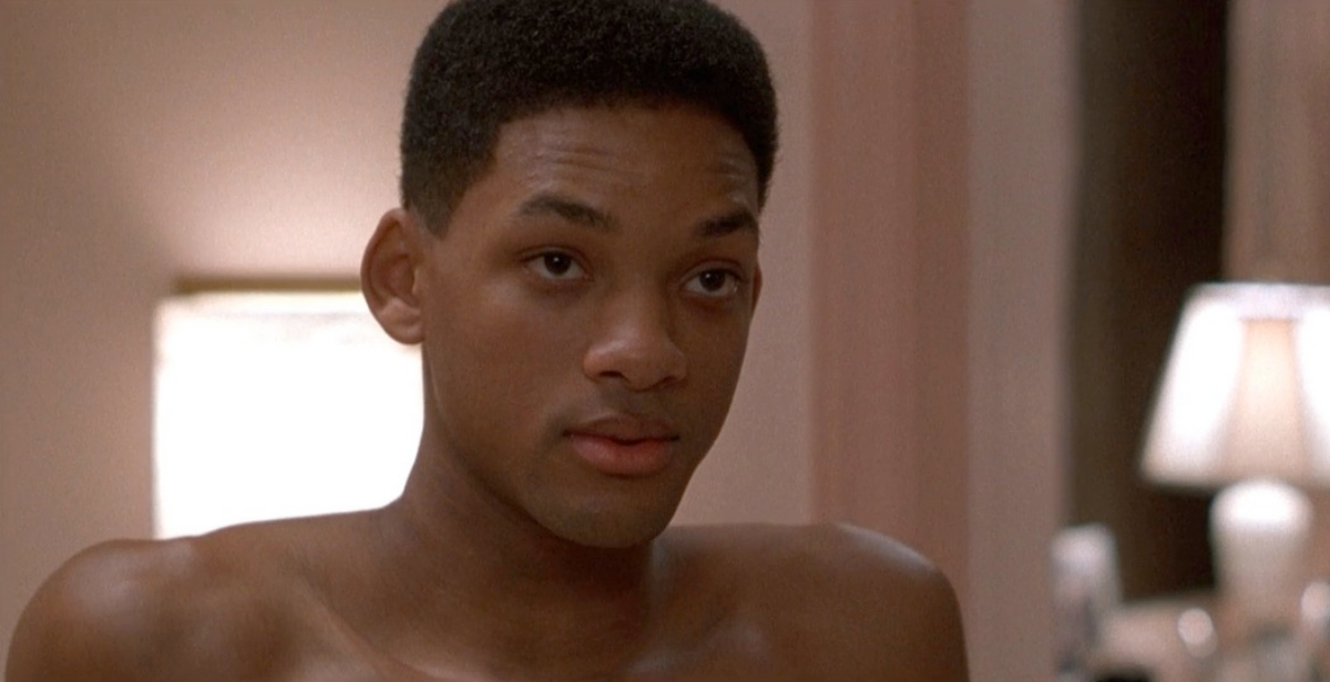 A close up of Will Smith shirtless.