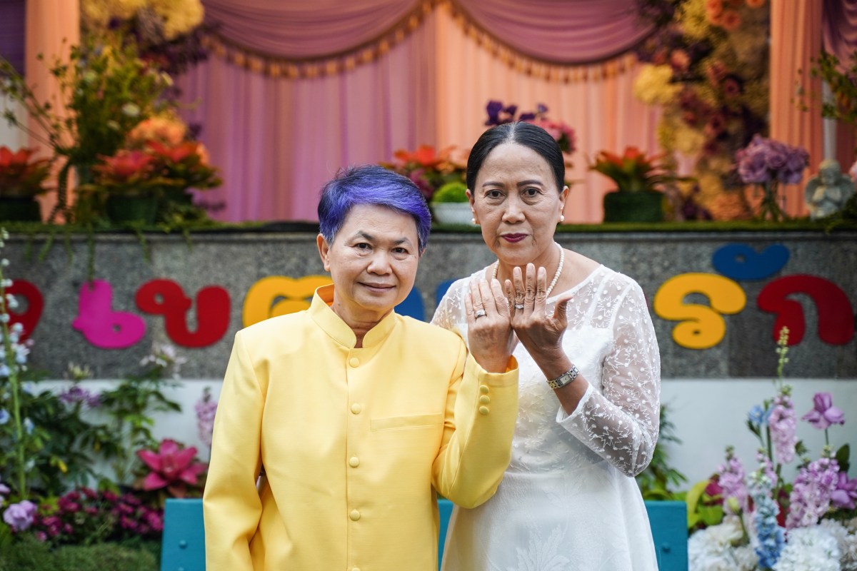 A couple shows off their rings following their marriage during an event to mark the country's same-sex marriage law coming into effect in Bangkok, Thailand, on January 23, 2025. (Photo by Anusak Laowilas/NurPhoto via Getty Images)