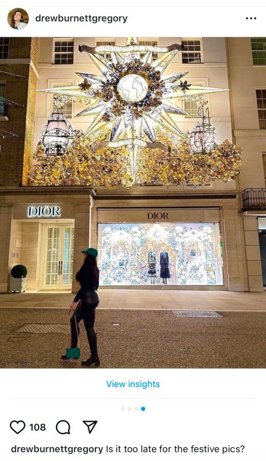 A photo of a woman in front of a Dior store with the caption Is it too late for festive pics?