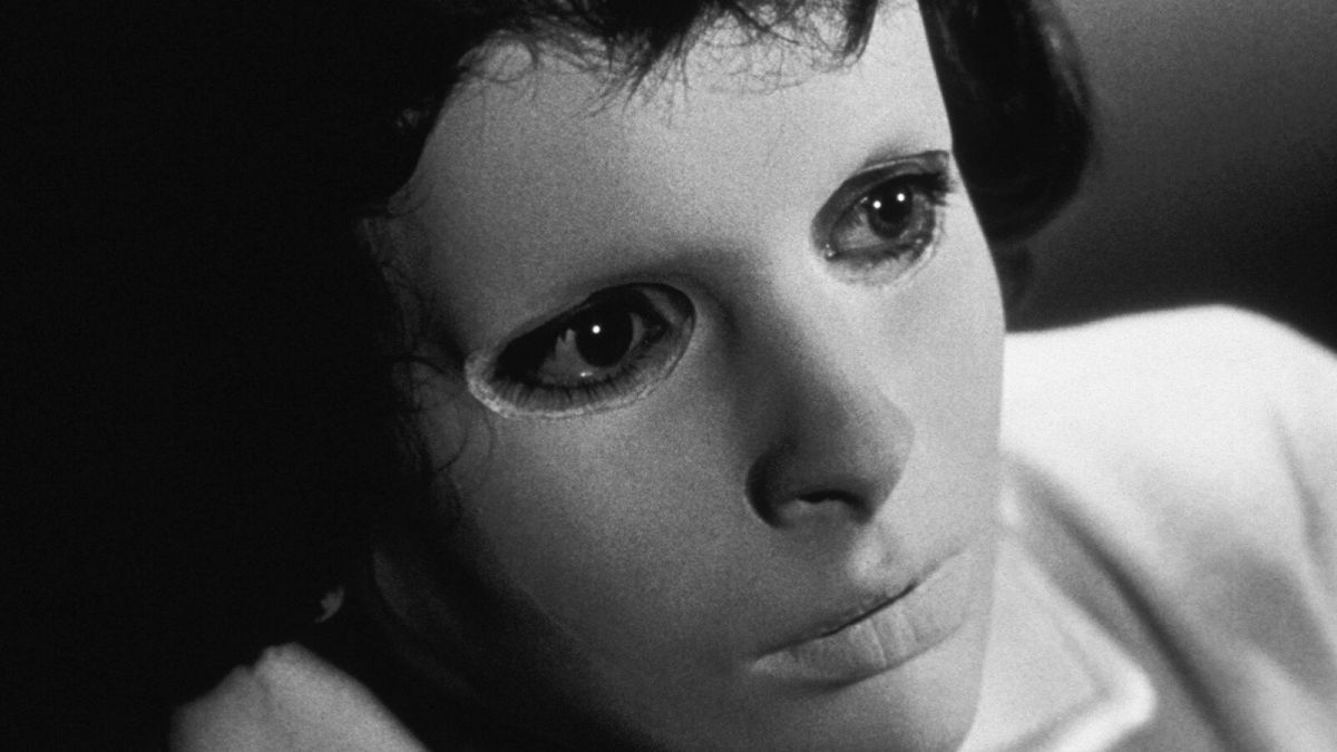 A close up on Édith Scob in a mask in Eyes Without a Face